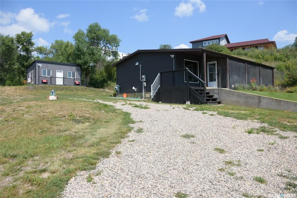 Property Photo:  719 Pasqua Lake Road  SK S0G 1S0 