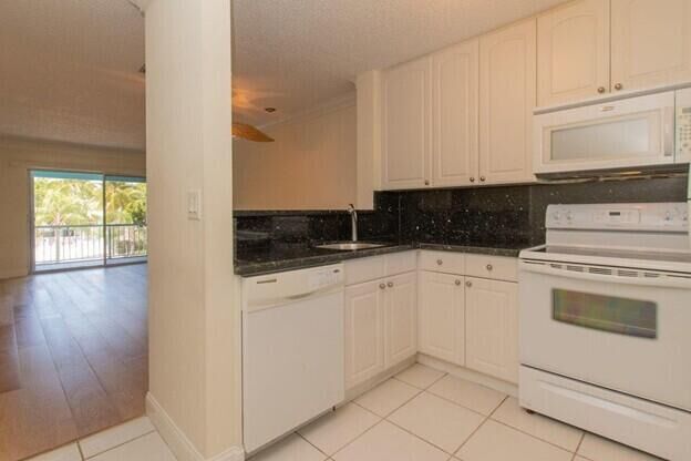Property Photo:  98402 Windward Avenue 98402  FL 33037 