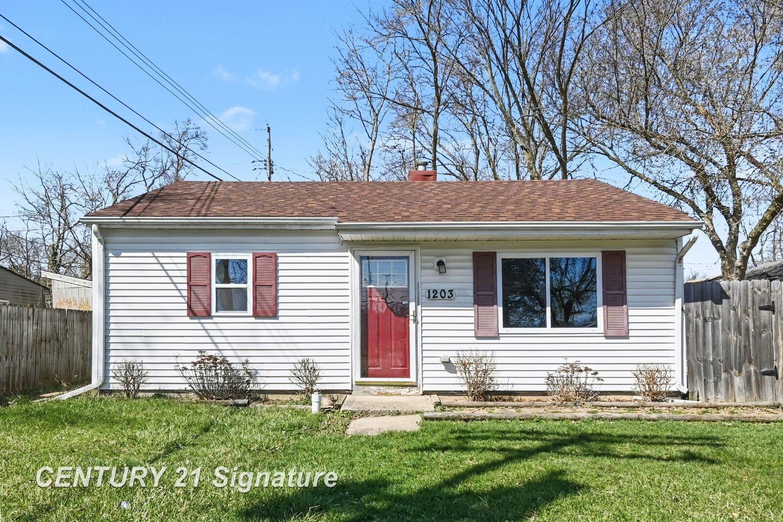 Property Photo:  1203 Warwick Drive  MI 48910 