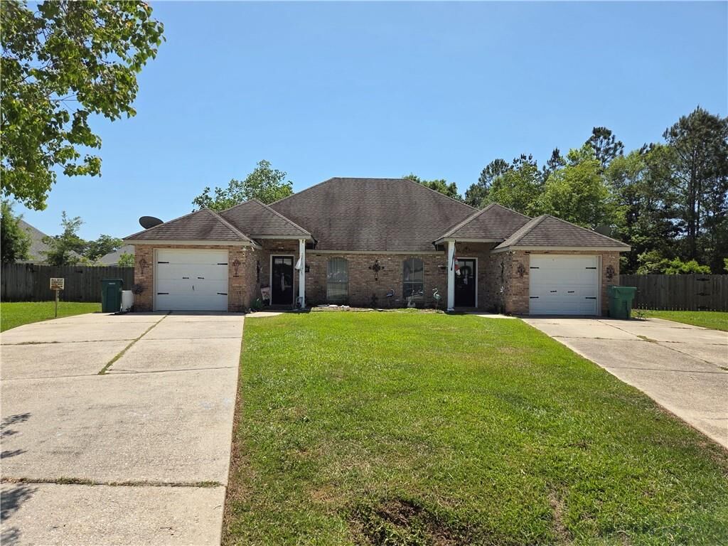Property Photo:  197-203 Remmy Court  LA 70448 