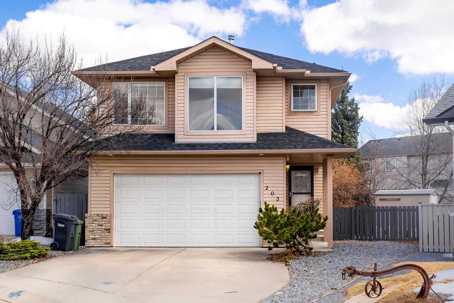 Property Photo: 203 Cambridge Bay AB T1P 1R9