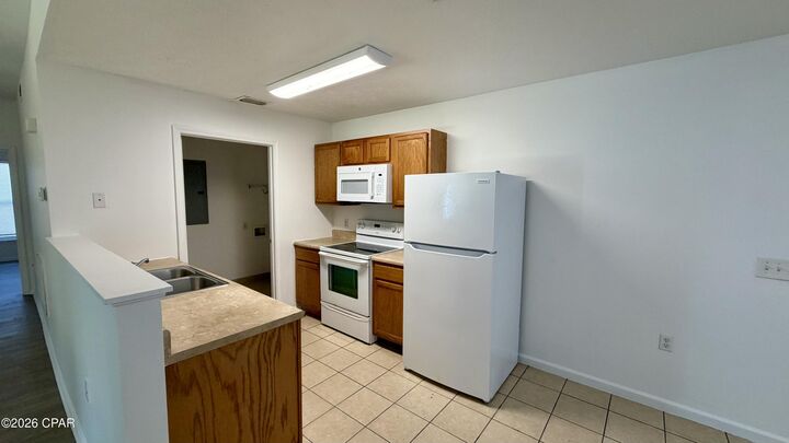 Property Photo:  9117 Laird Street 9127  FL 32408 