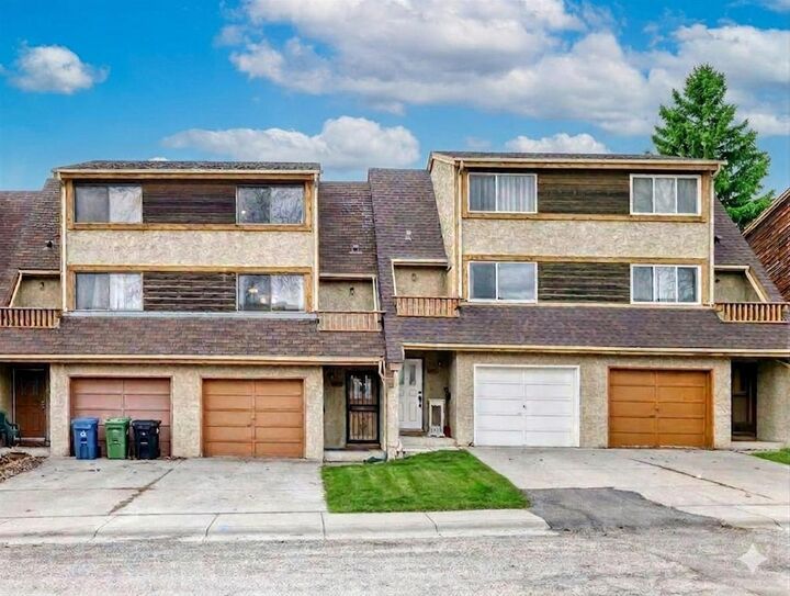 Property Photo:  6909 Ranchero Road NW  AB T3G 1J6 
