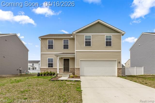 Property Photo:  9053 Sandstone Drive  MI 48166 