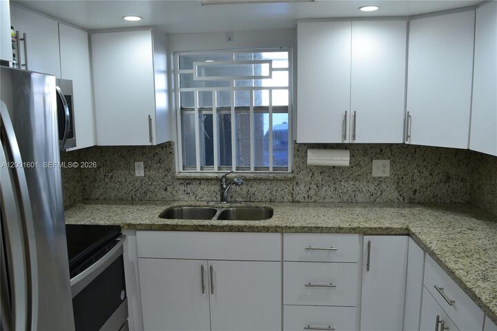 Property Photo: 220 NW 87th Ave K110 FL 33172