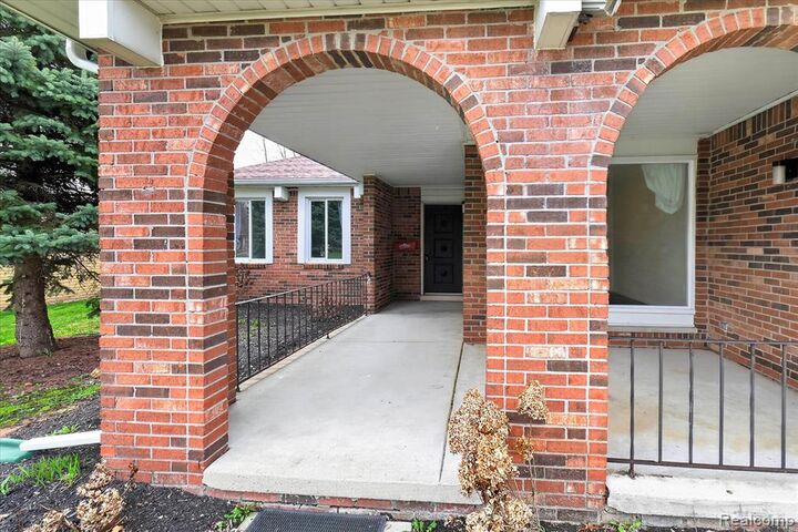 Property Photo:  43737 Westminister Way  MI 48187 3158 