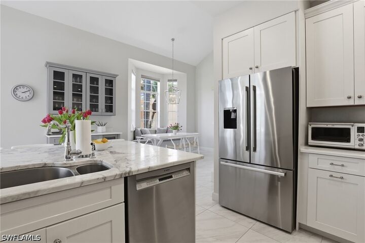 Property Photo:  14811 Sterling Oaks Drive  FL 34110 