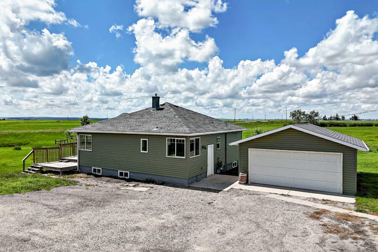 Property Photo: 225074 Highway 561 AB T1P 2C1