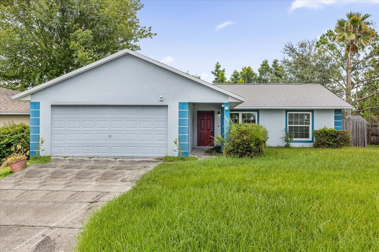 Property Photo:  203 Larkspur Court  FL 34743 