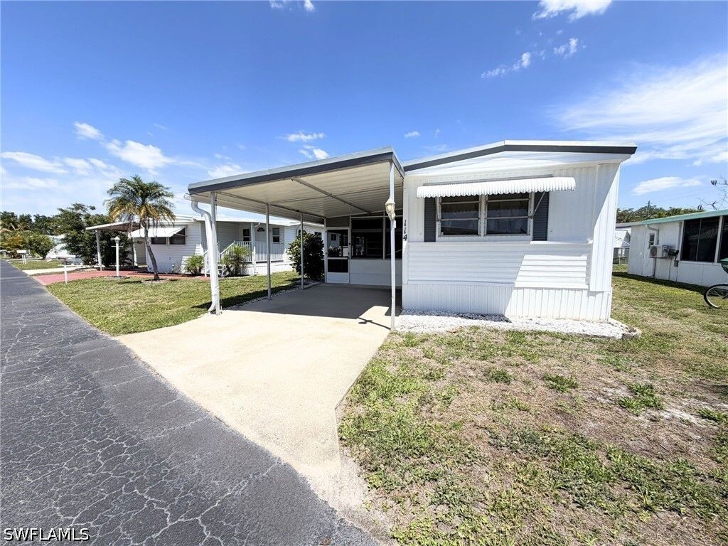 Property Photo:  114 Rose Lane 111  FL 34114 