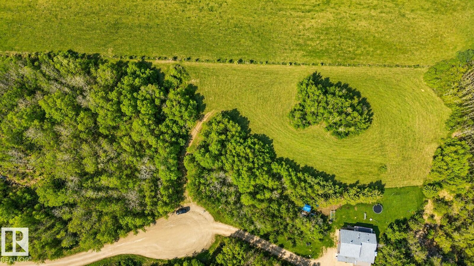 Property Photo: 115 57415 Range Road 101 AB T0A 3A1