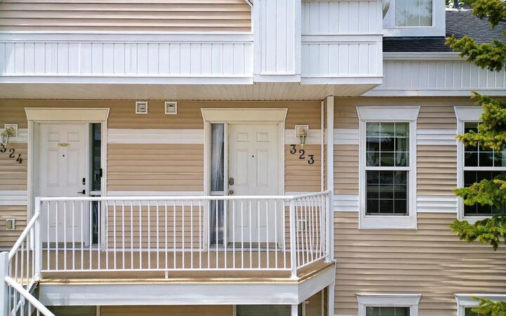 Property Photo: 103 Strathaven Drive E 323 AB T1P 1W3