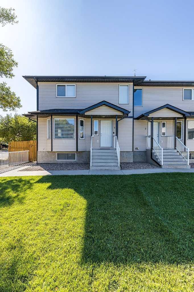 Property Photo:  115 3 Street NE 1  AB T0J 2P0 