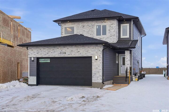 Property Photo: 335 Sharma Crescent SK S7W 1J1
