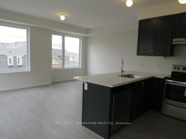 Property Photo:  1711 Pure Springs Boulevard 209  ON L1X 0E3 