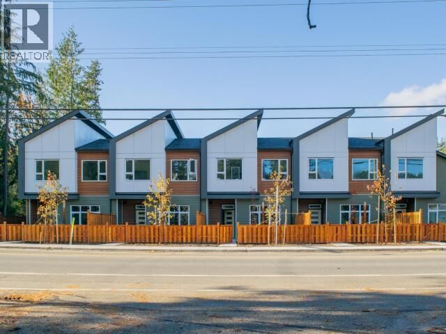 Property Photo:  103-5191 Manson Ave  BC V8A 3P2 