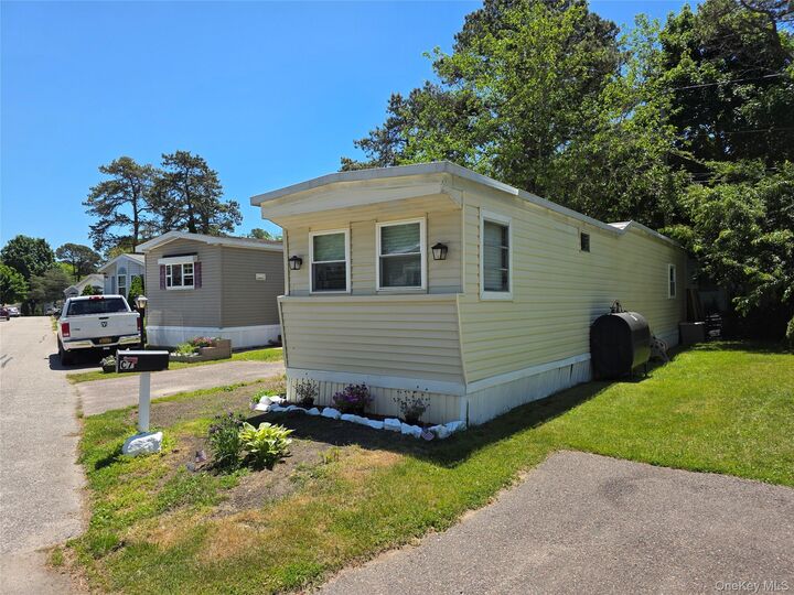 Property Photo: 525 Riverleigh Ave C7 NY 11901
