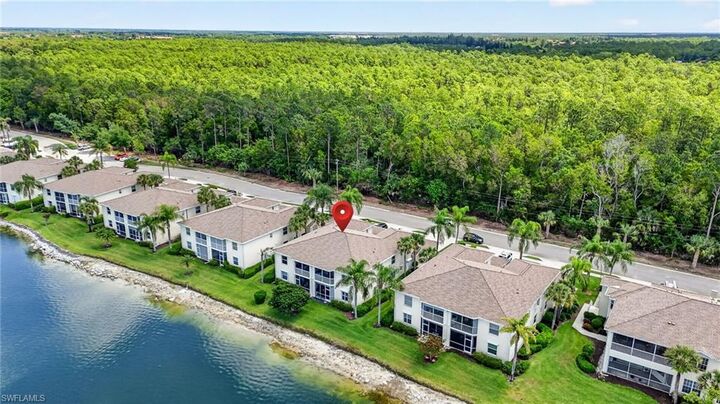 Property Photo: 3330 W Crown Pointe Blvd 101 FL 34112