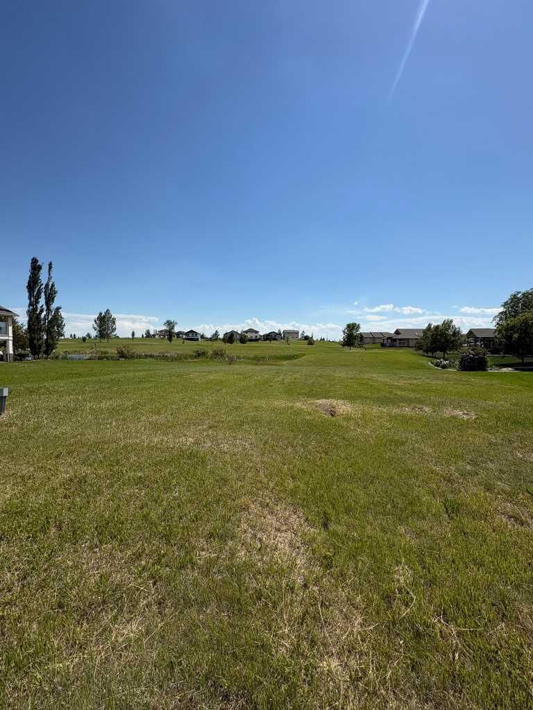 Property Photo: 709 Whispering Greens Avenue AB T0L 2B0