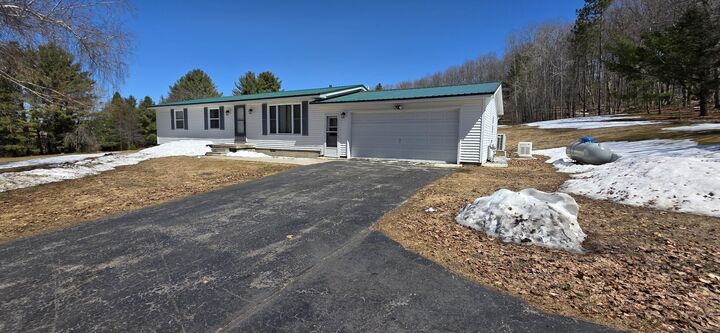 Property Photo:  5505 N 3 Mile Rd  MI 49745 