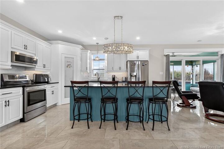 Property Photo:  949 Elmwood Drive  NB E1H 2H1 
