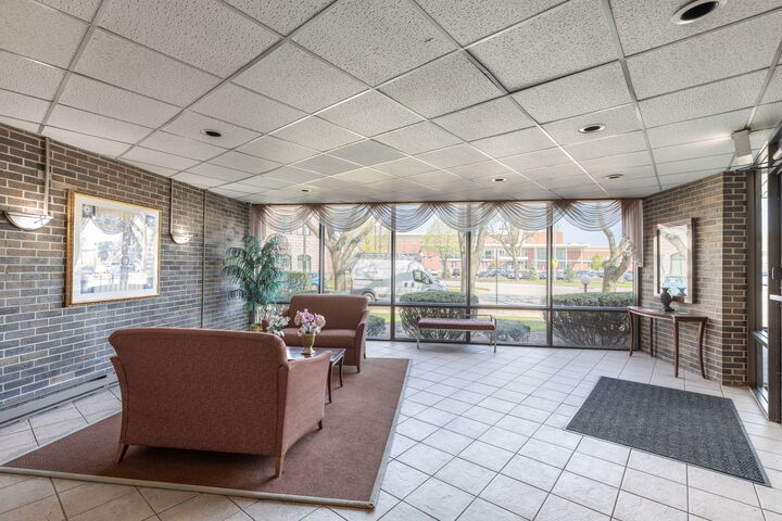 Property Photo:  5019 Mulford Street 205  IL 60077 