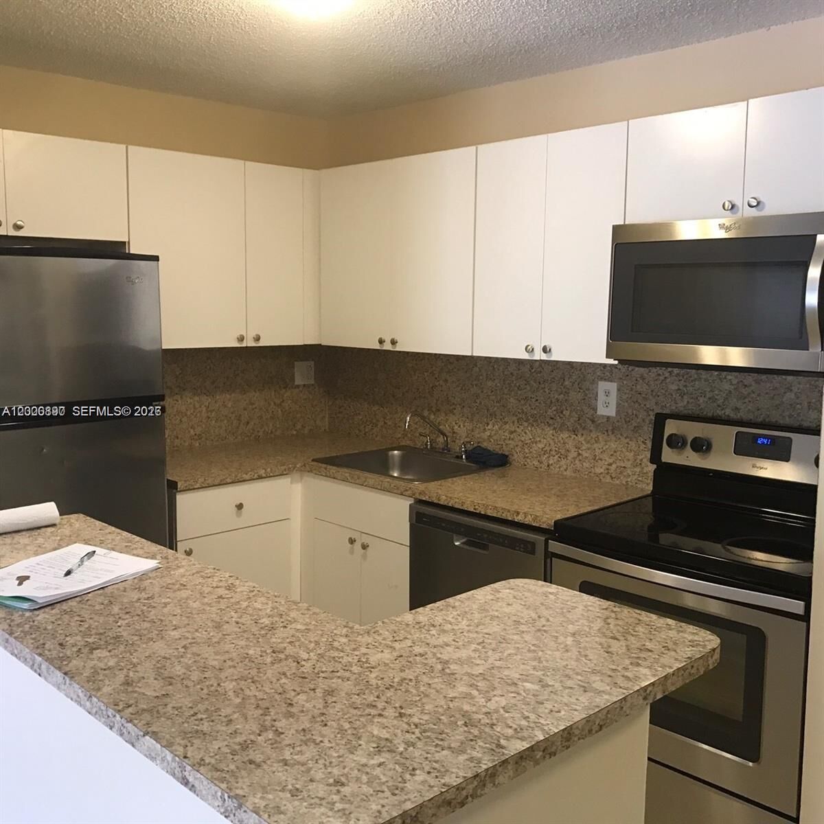 Property Photo:  7200 NW 179th St 302  FL 33015 