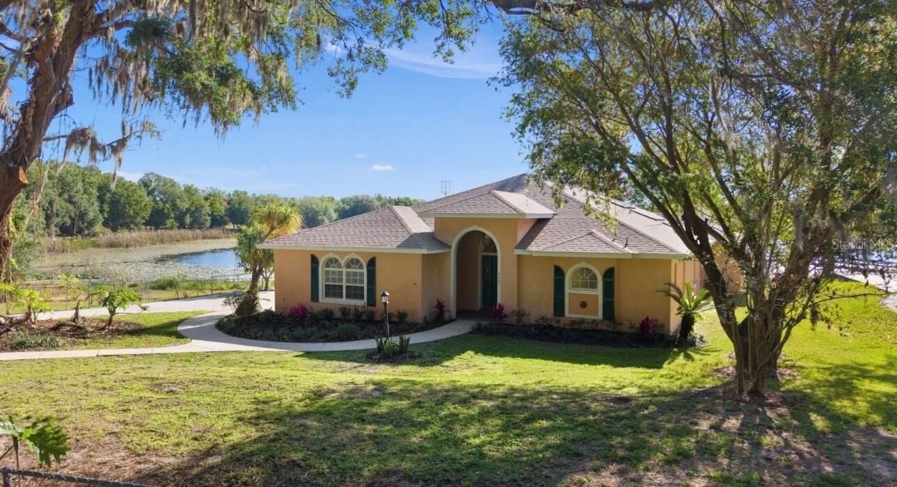 Property Photo:  9440 County Road 561  FL 34711 