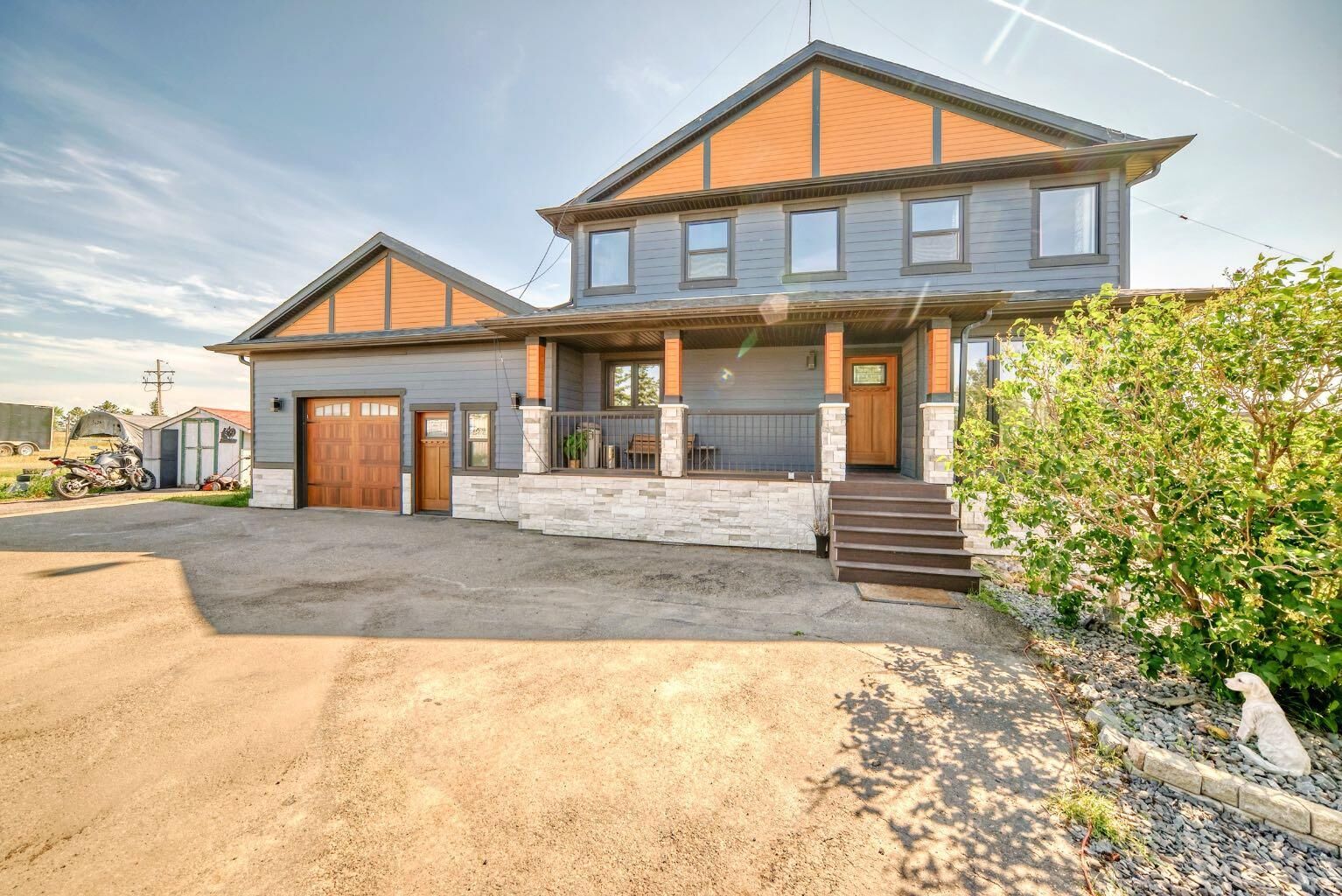 Property Photo: 240076 Paradise Meadow Drive AB T1X 0M8