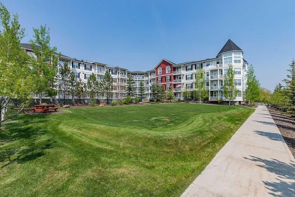 Property Photo:  1 Crystal Green Lane 137  AB T1S 0C5 