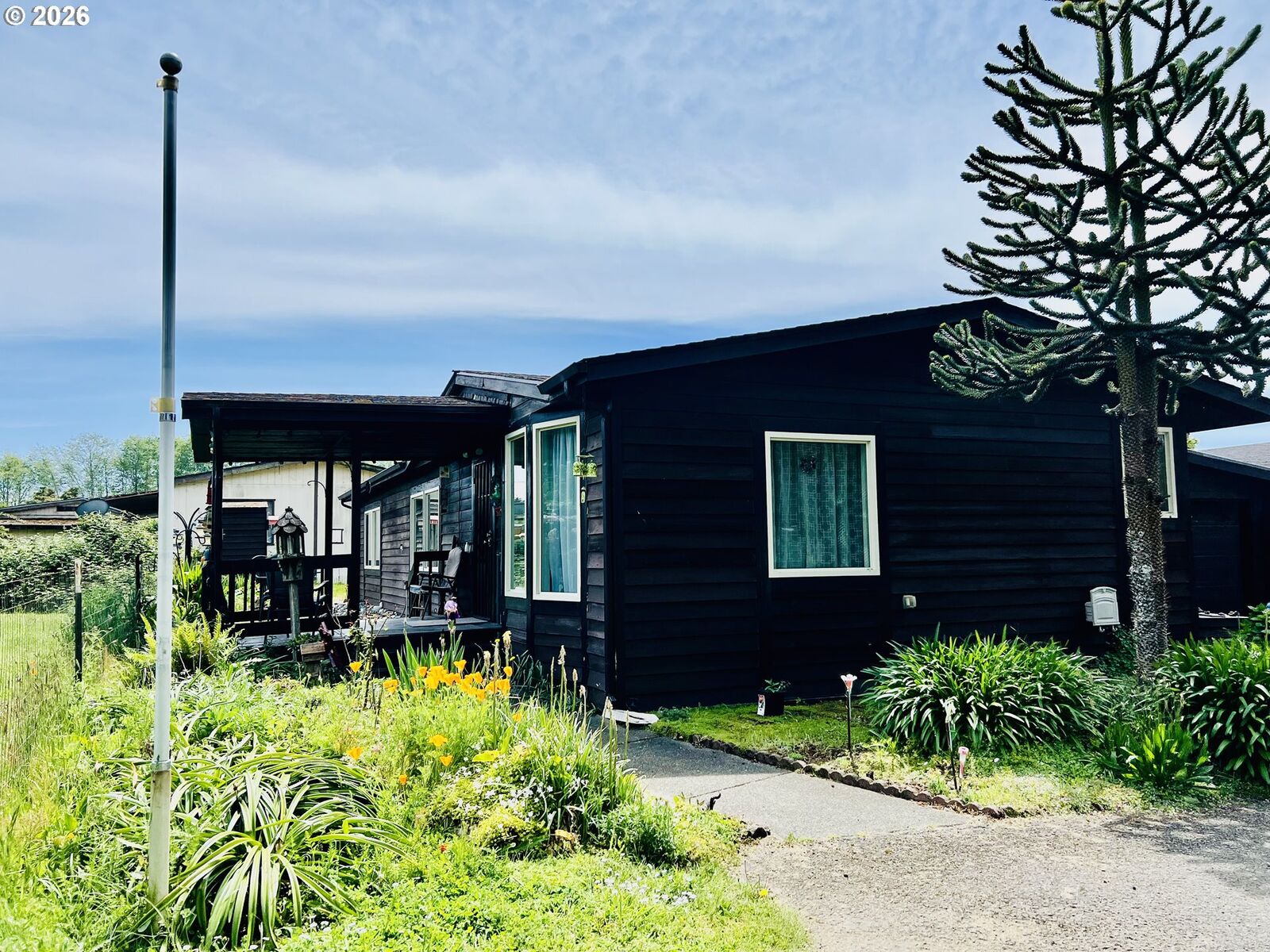 Property Photo:  16063 Driftwood Ln 10  OR 97415 