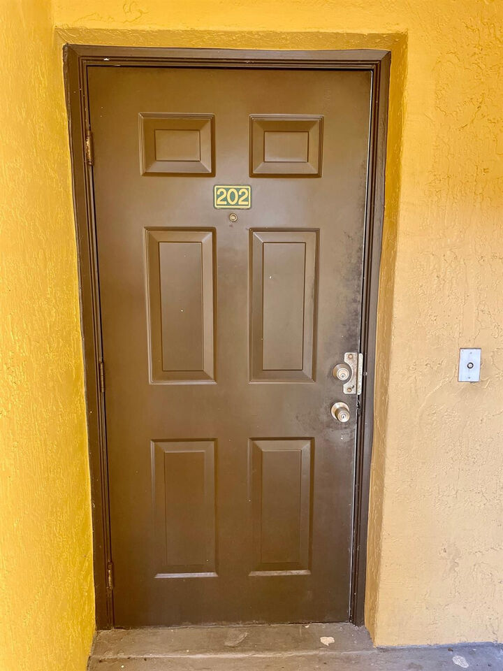 Property Photo:  9615 NW 1st Court 10-202  FL 33024 