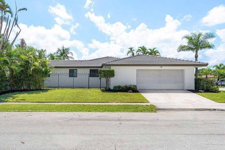 Property Photo:  1200 SW 8th Street  FL 33486 