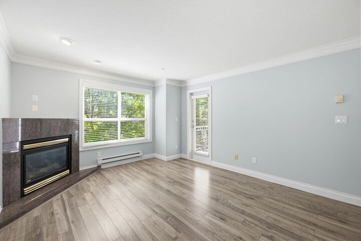 Property Photo: 8115 121A Street 202 BC V3W 1J2