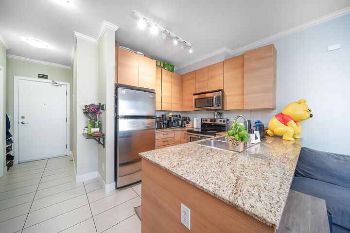 Property Photo: 5788 Sidley Street 214 BC V5J 5E5