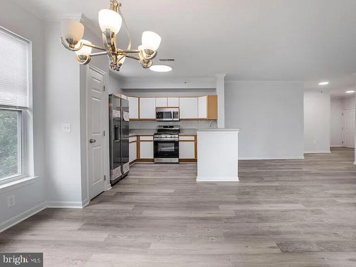 Property Photo:  1301 Karen Boulevard 401  MD 20743 