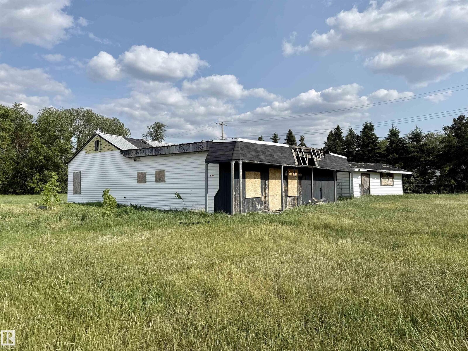 Property Photo: 4913 & 4909 49 Avenue AB T0A 1P0