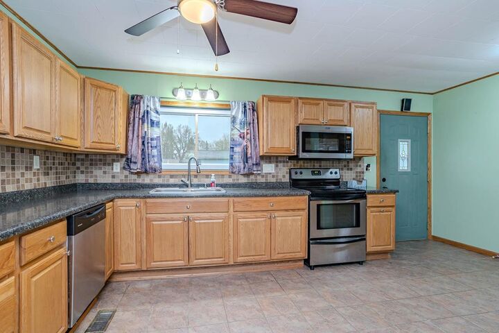 Property Photo:  701 Cottage St  WI 54452 