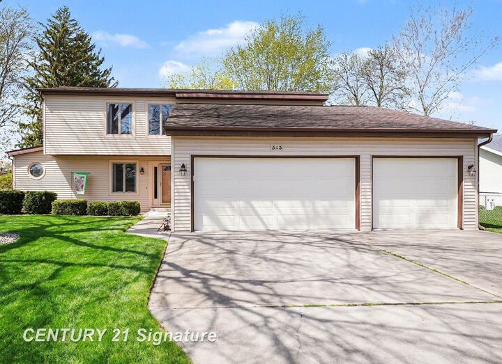 Property Photo:  563 Puritan Drive  MI 48638 