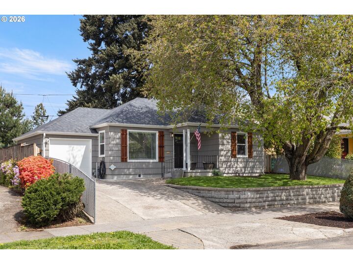 Property Photo:  9045 SE Alder St  OR 97216 