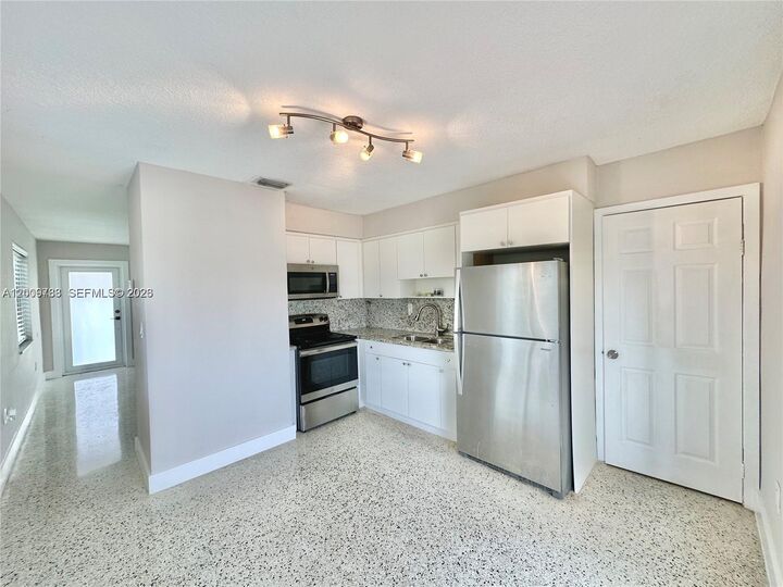 Property Photo:  10303 NW 35th Pl  FL 33147 