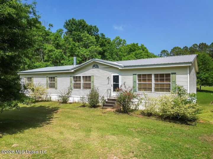 Property Photo:  17112 Camellia Street  MS 39556 