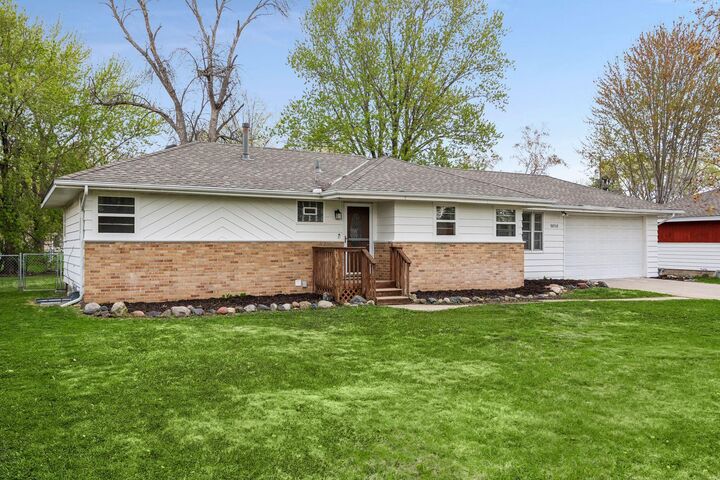 Property Photo:  9858 93rd Place N  MN 55369 