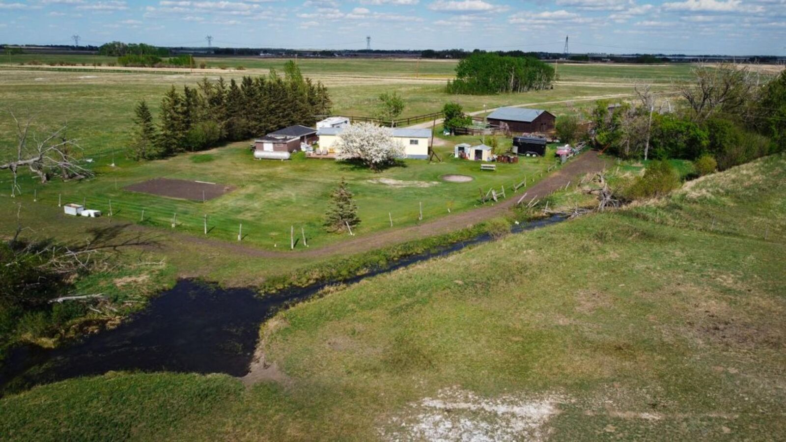 Property Photo: 240141 Range Road 274 AB T1X 2H9