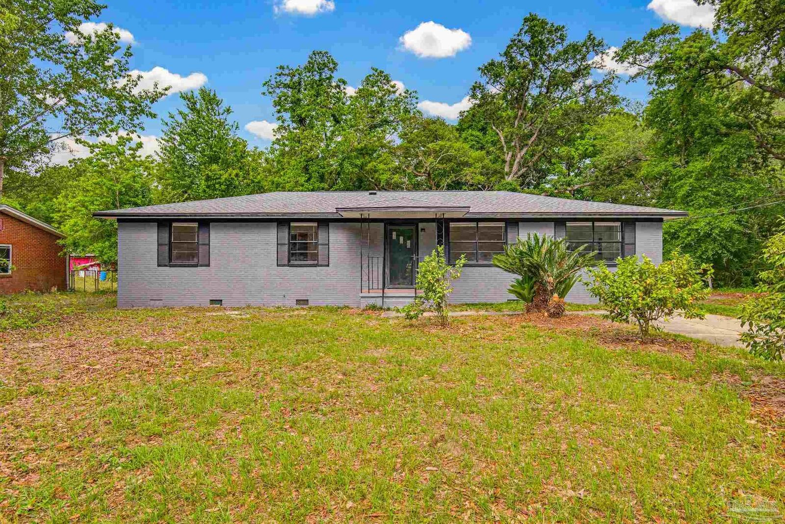 Property Photo:  909 N 74th Ave  FL 32506 