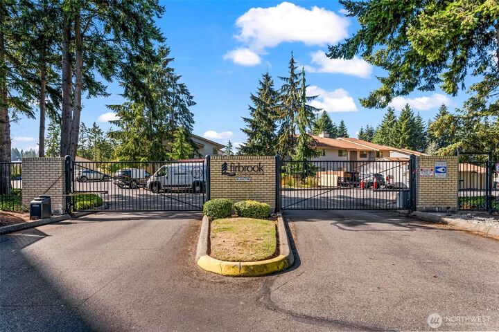 Property Photo:  7606  37th Street W B3  WA 98466 