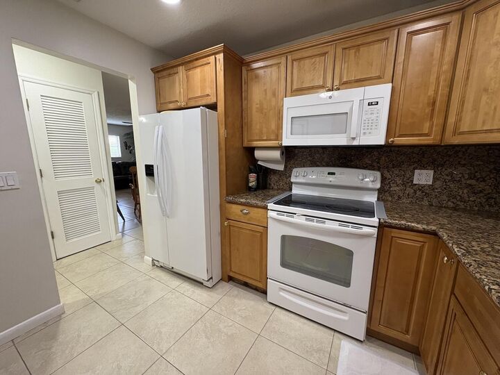 Property Photo:  22765 SW 66th Avenue 204  FL 33428 