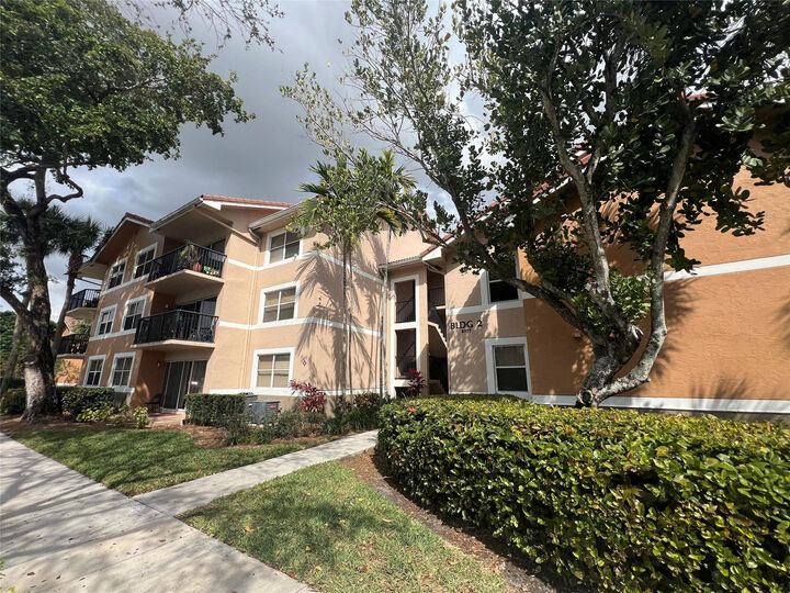 Property Photo:  8977 Wiles Road 206  FL 33067 