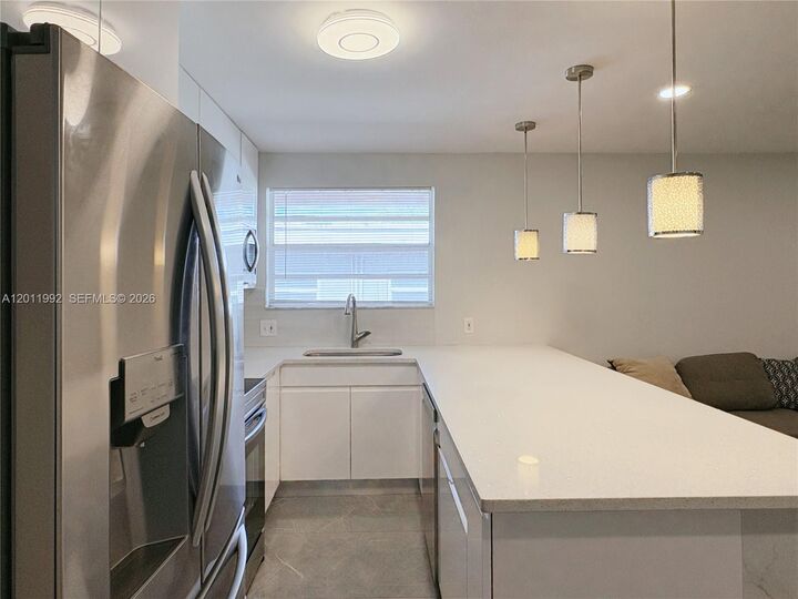 Property Photo:  724 NE 3rd St 1  FL 33009 