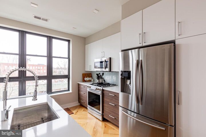 Property Photo:  1345 K Street SE 407  DC 20003 
